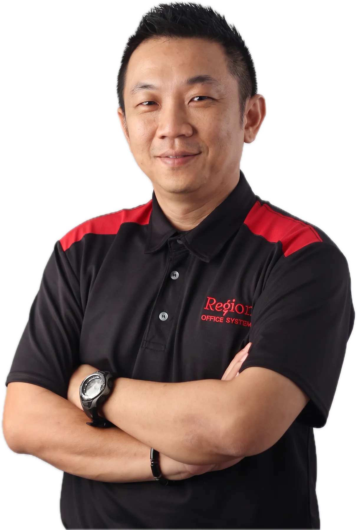 James Wong in his Region polo shirt, arms crossed, smiling